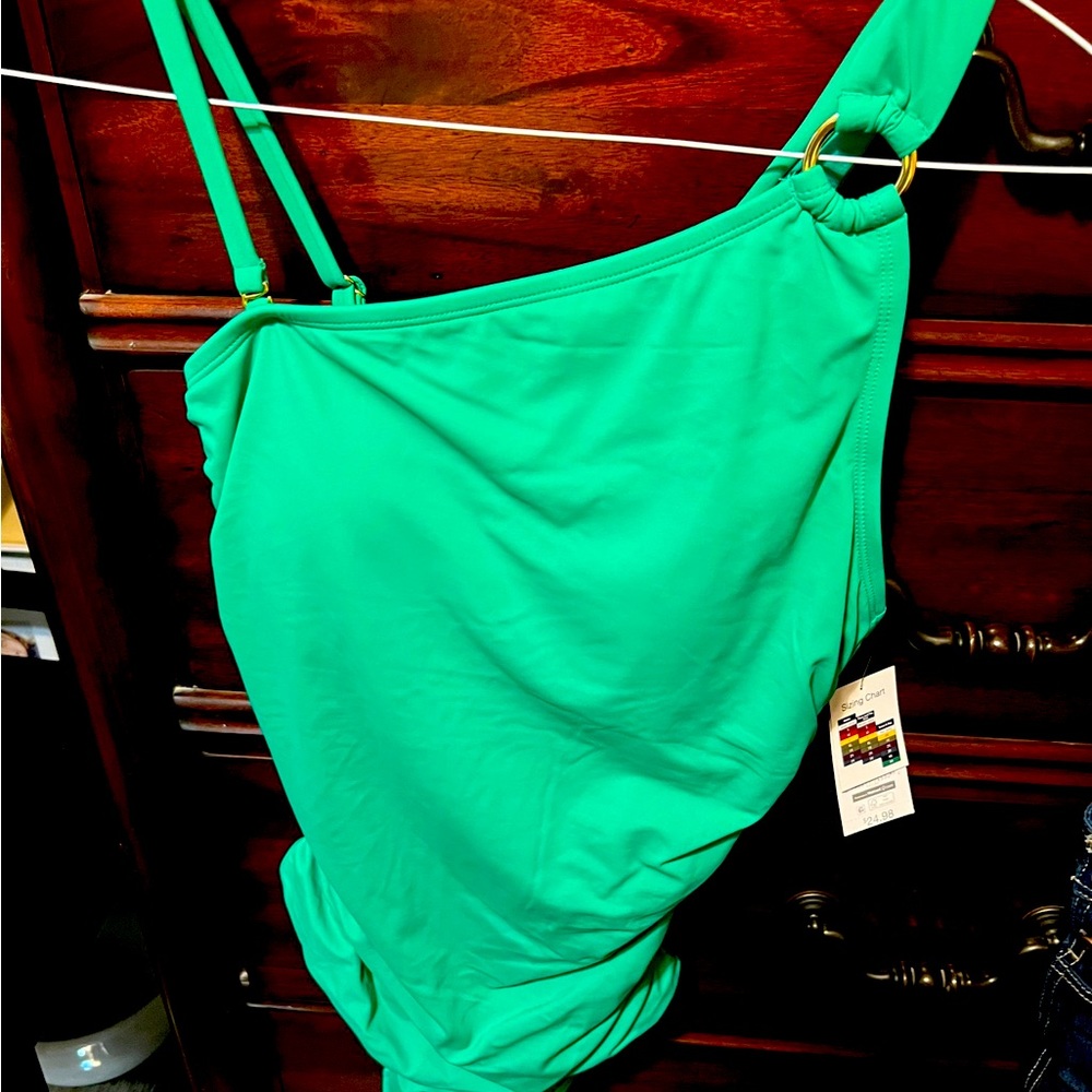 Lovingly used women’s  clothes, swimsuits. Great condition, no smoking or pets.